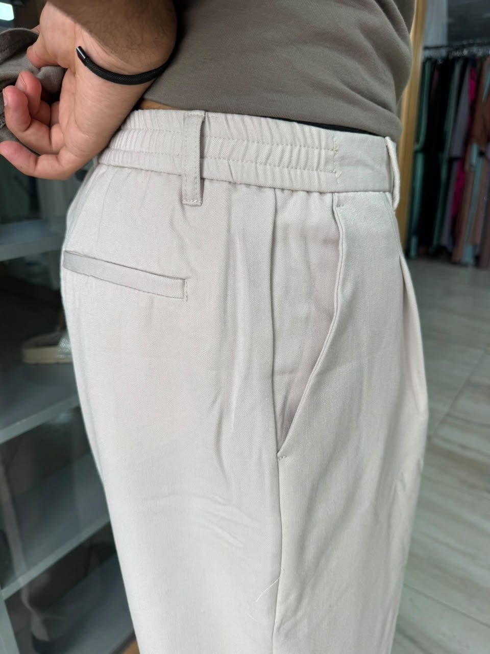 PLEATED WIDE LEG TROUSERS